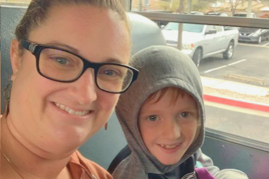 A young boy and his mom riding the bus together and smiling for a selfie. The Read Better Be Better logo is in the upper right corner.