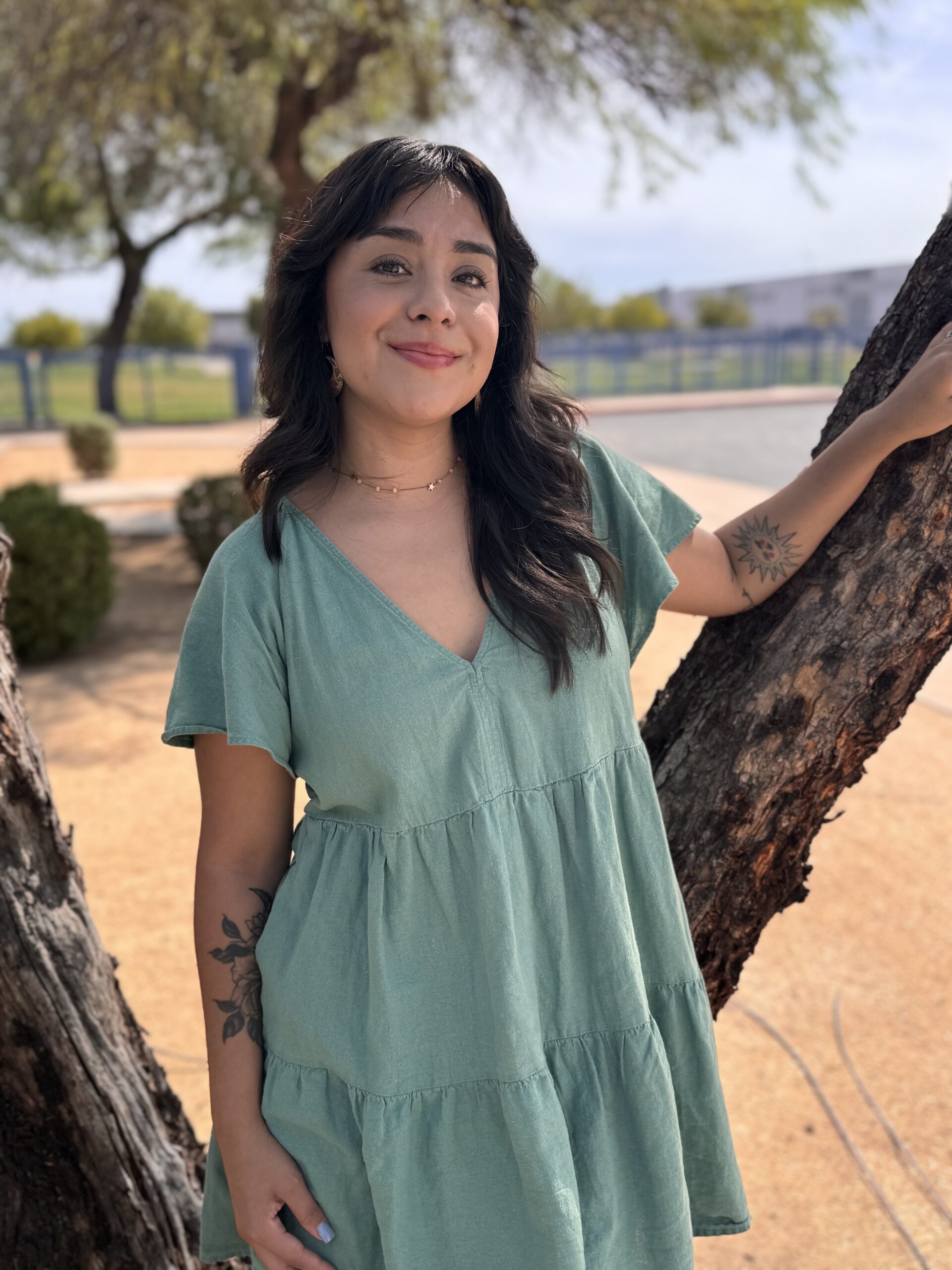 Andrea smiling at the camera